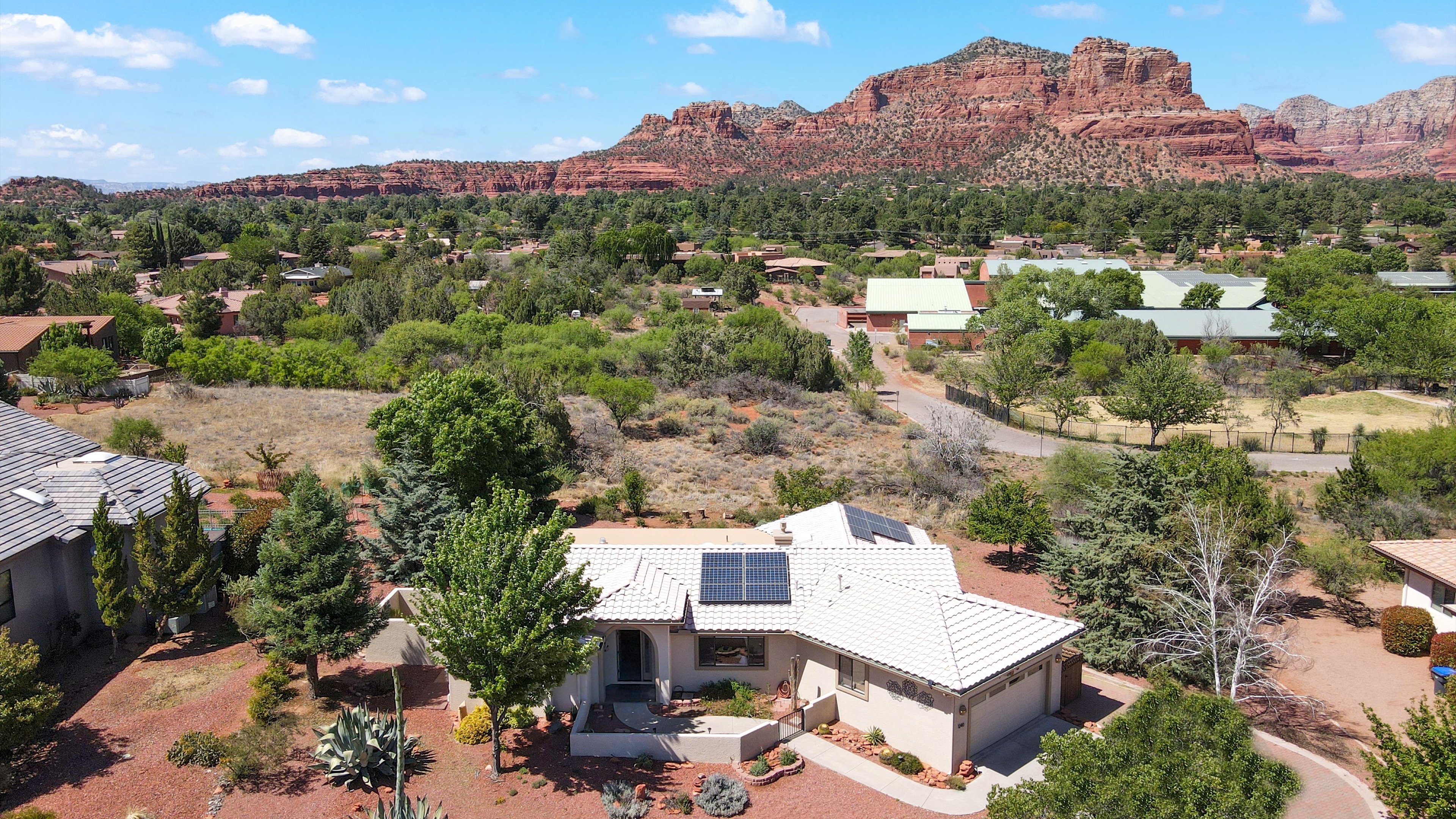 Aerial view showing the neighborhood and red rock formations