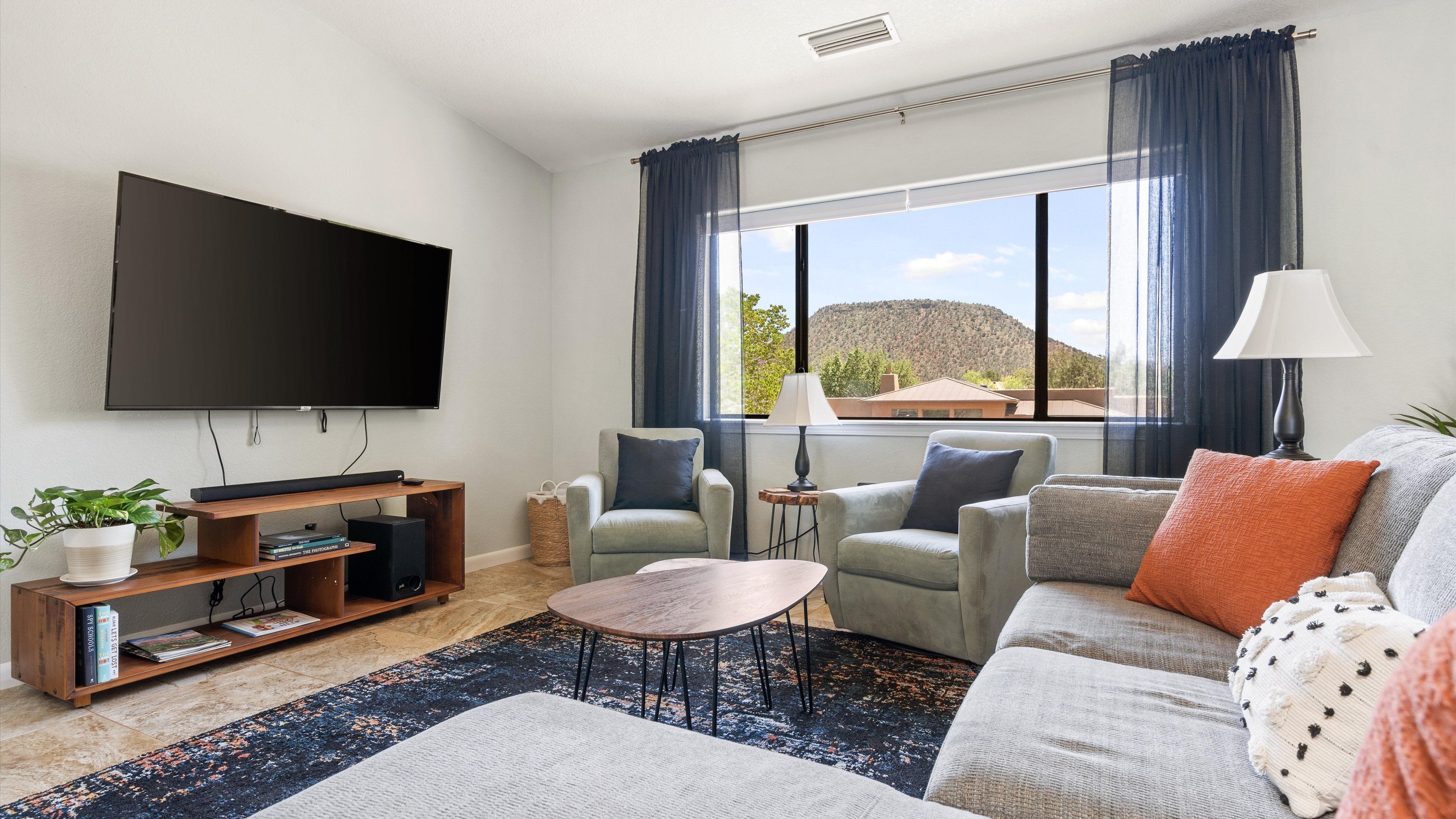 Master bedroom sitting area with red rock views