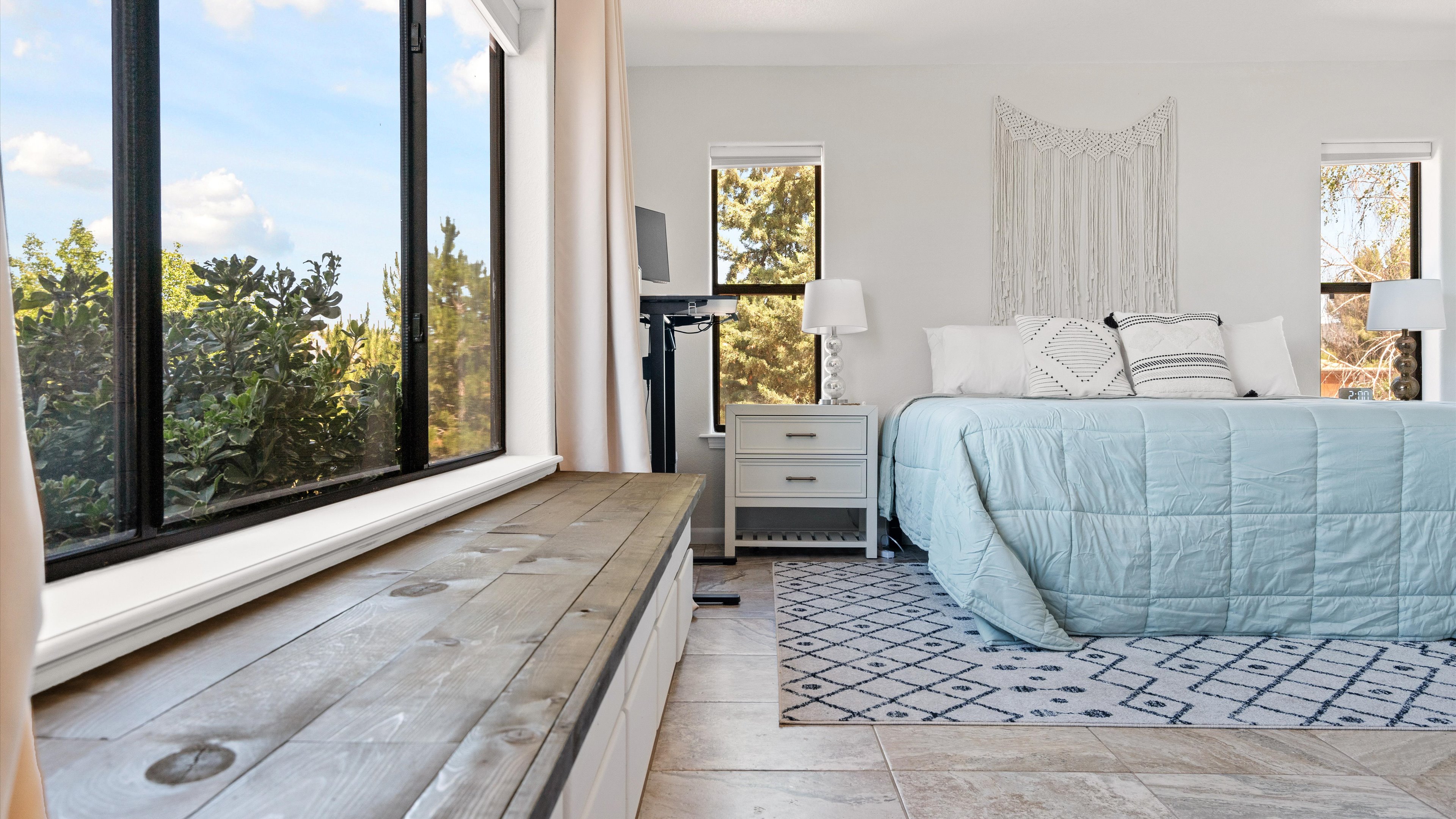 Living room seating with red rock views
