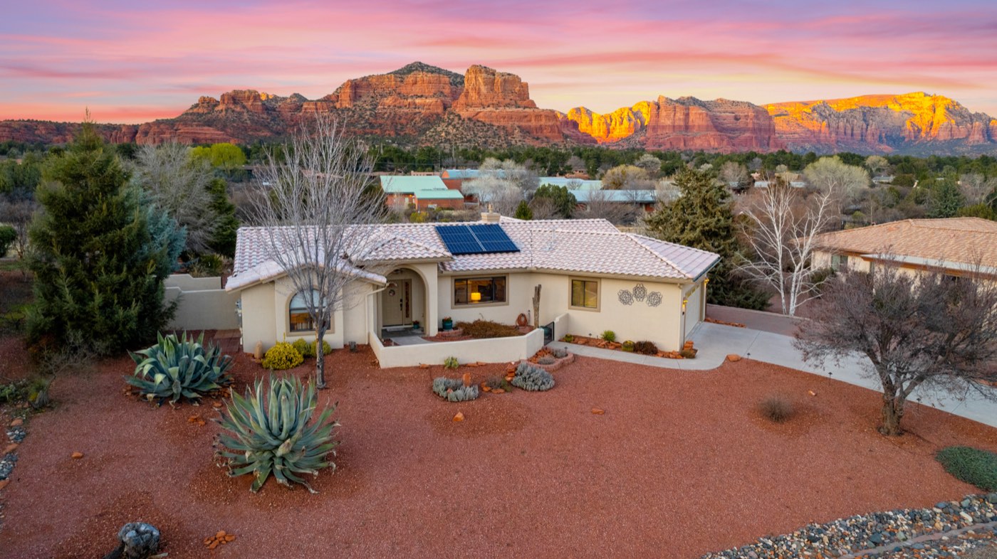Aerial view of Agave Abode with red rock formations in the background, Sedona Arizona